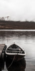 Boot in einem See in der Nähe der Berge Poster - Posterbox.dk